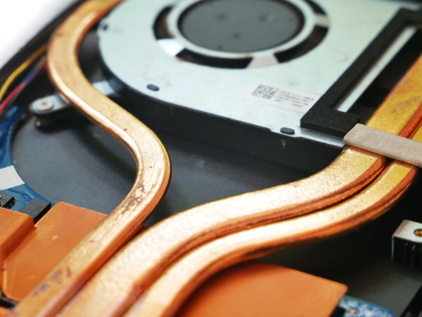 Copper heat pipes used for CPU cooling inside a laptop.
